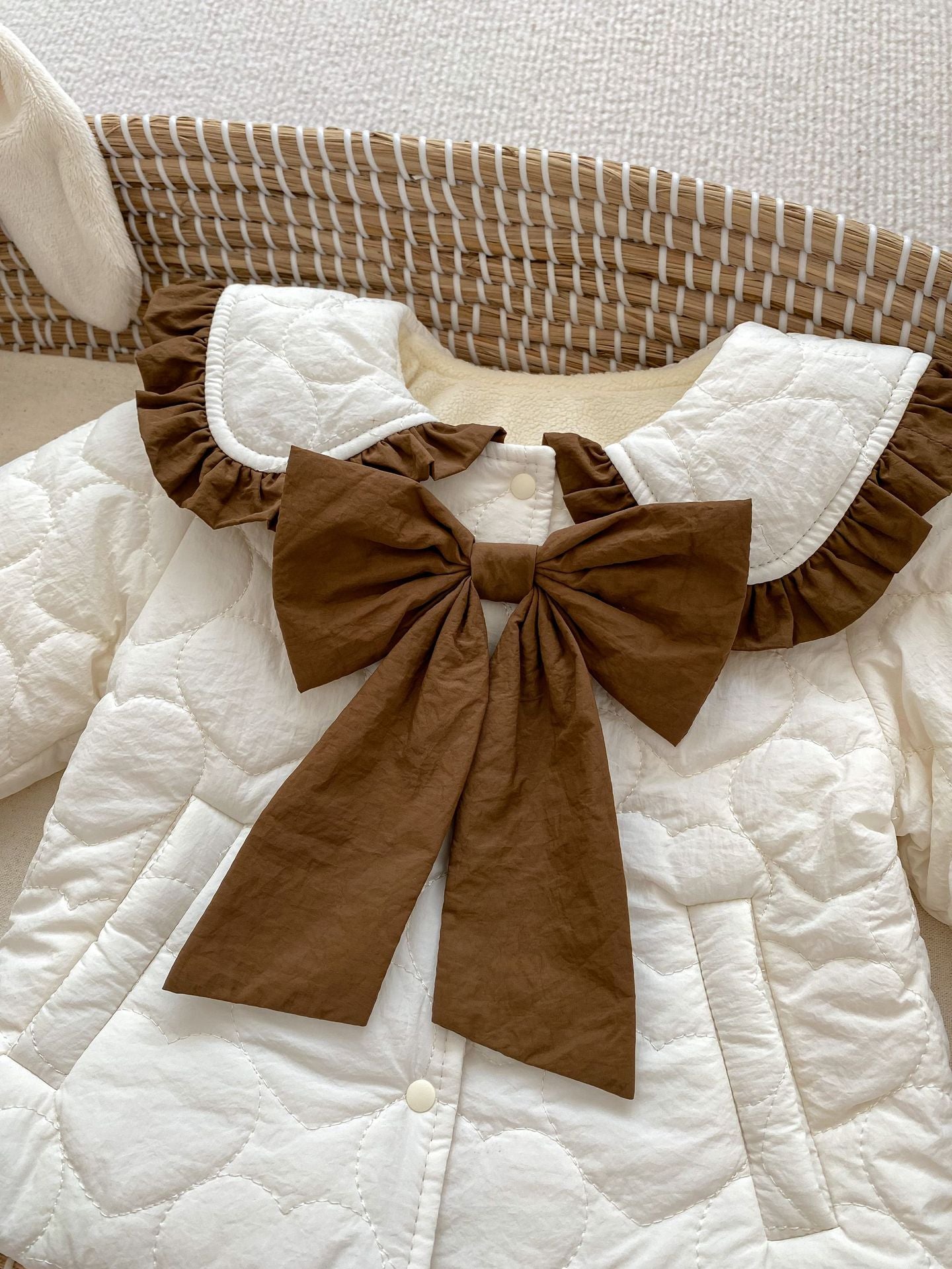 Baby girl beige cardigan coat with bow tie design, thickened long sleeves, perfect for winter wear.