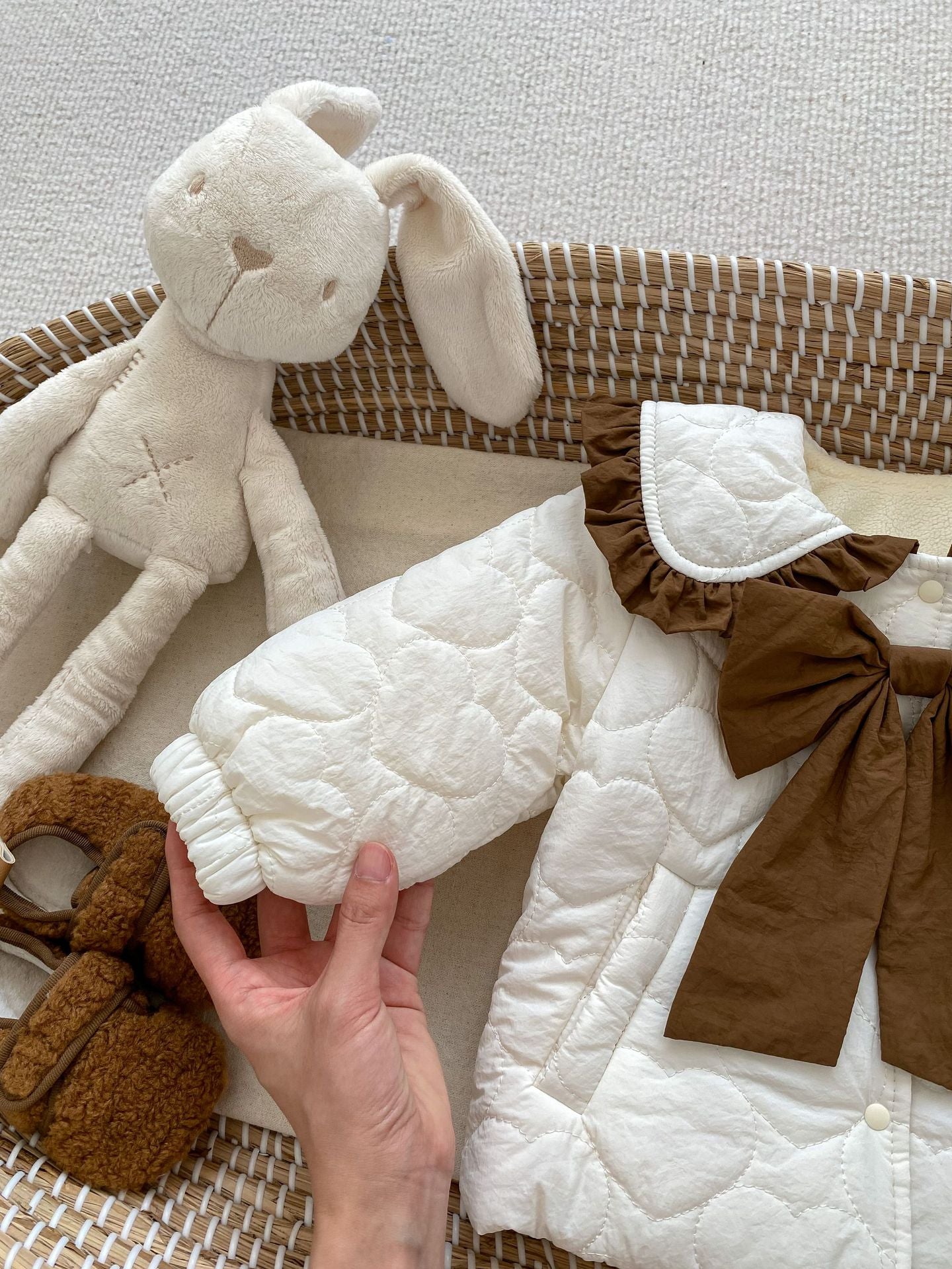 Baby girl beige cardigan coat with bow tie design, thickened long sleeves, perfect for winter wear.