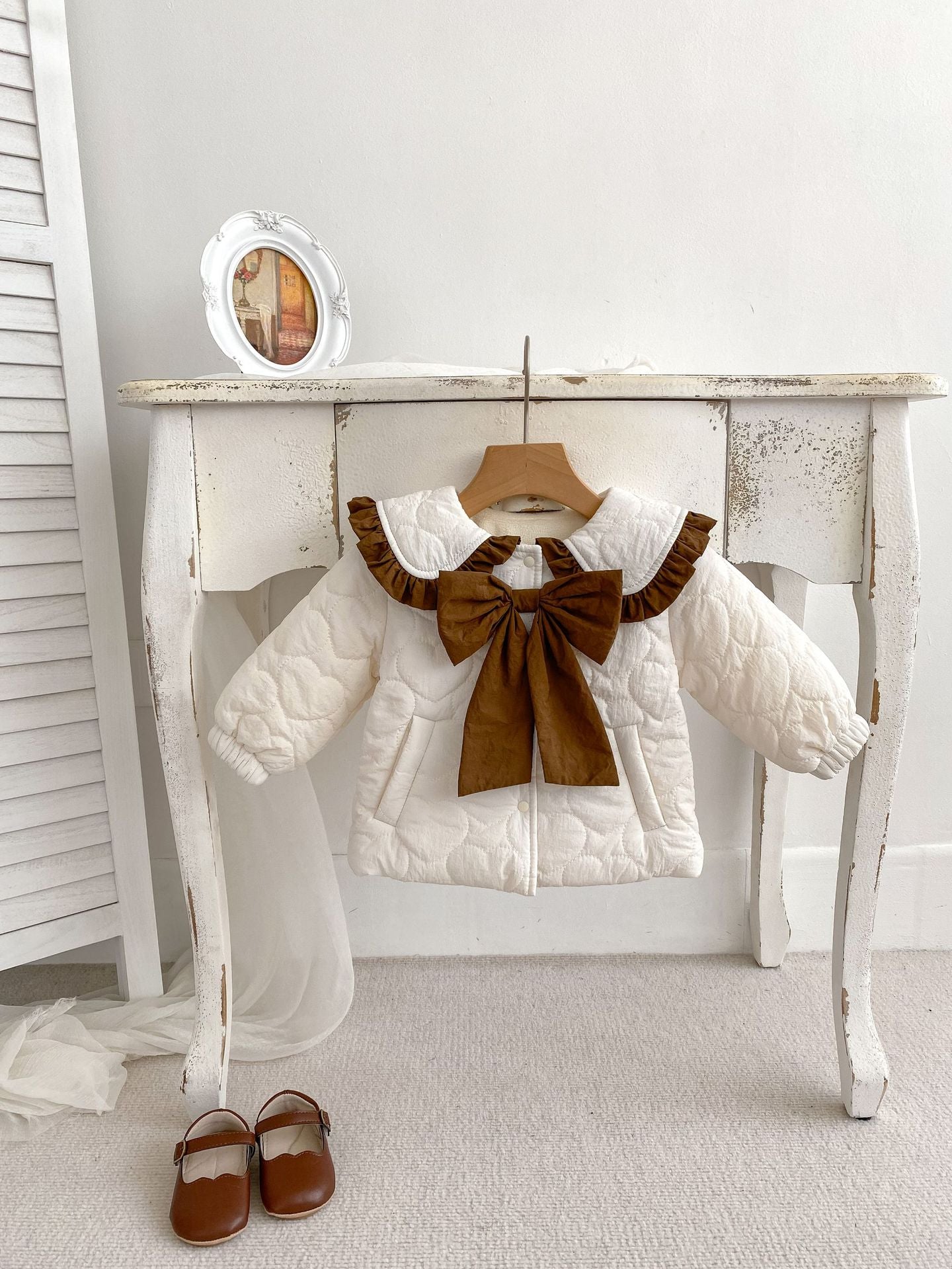 Baby girl beige cardigan coat with bow tie design, thickened long sleeves, perfect for winter wear.
