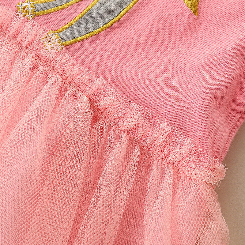 A pink baby girl dress featuring cartoon embroidery and a sheer mesh overlay, perfect for special occasions.