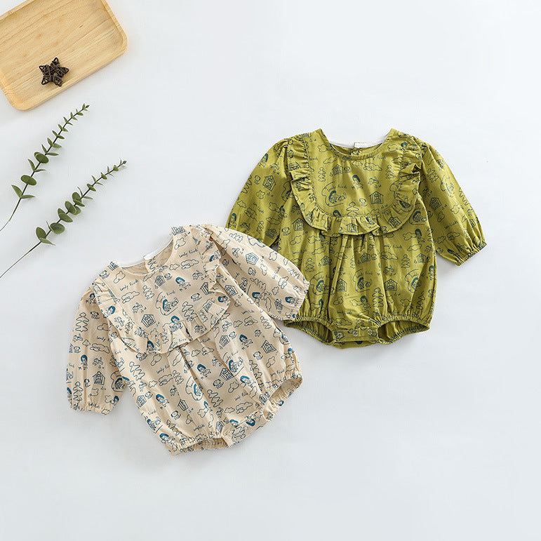 Baby girl wearing a soft cotton bodysuit with a cartoon pattern in green and apricot colors.