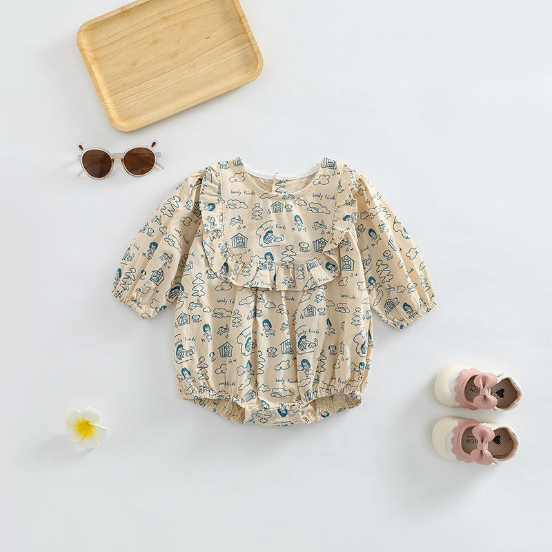 Baby girl wearing a soft cotton bodysuit with a cartoon pattern in green and apricot colors.