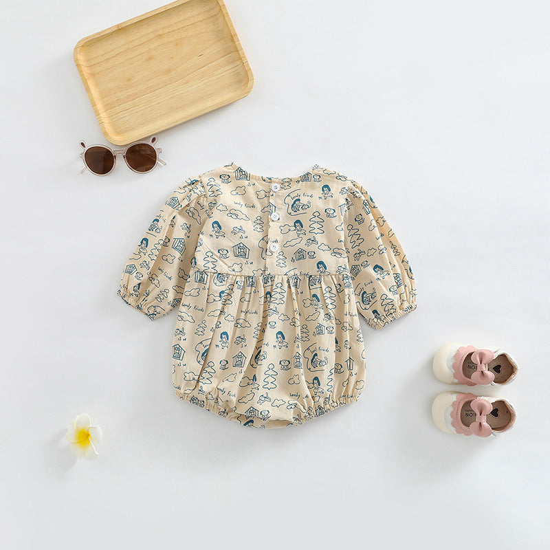 Baby girl wearing a soft cotton bodysuit with a cartoon pattern in green and apricot colors.