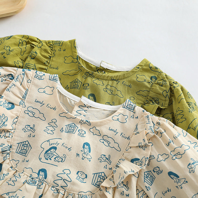 Baby girl wearing a soft cotton bodysuit with a cartoon pattern in green and apricot colors.