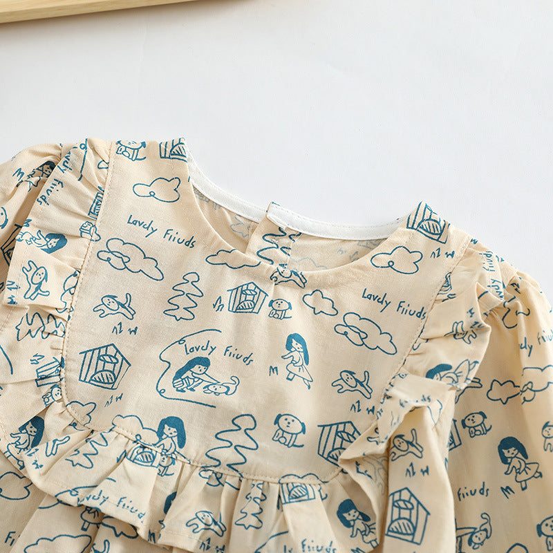 Baby girl wearing a soft cotton bodysuit with a cartoon pattern in green and apricot colors.