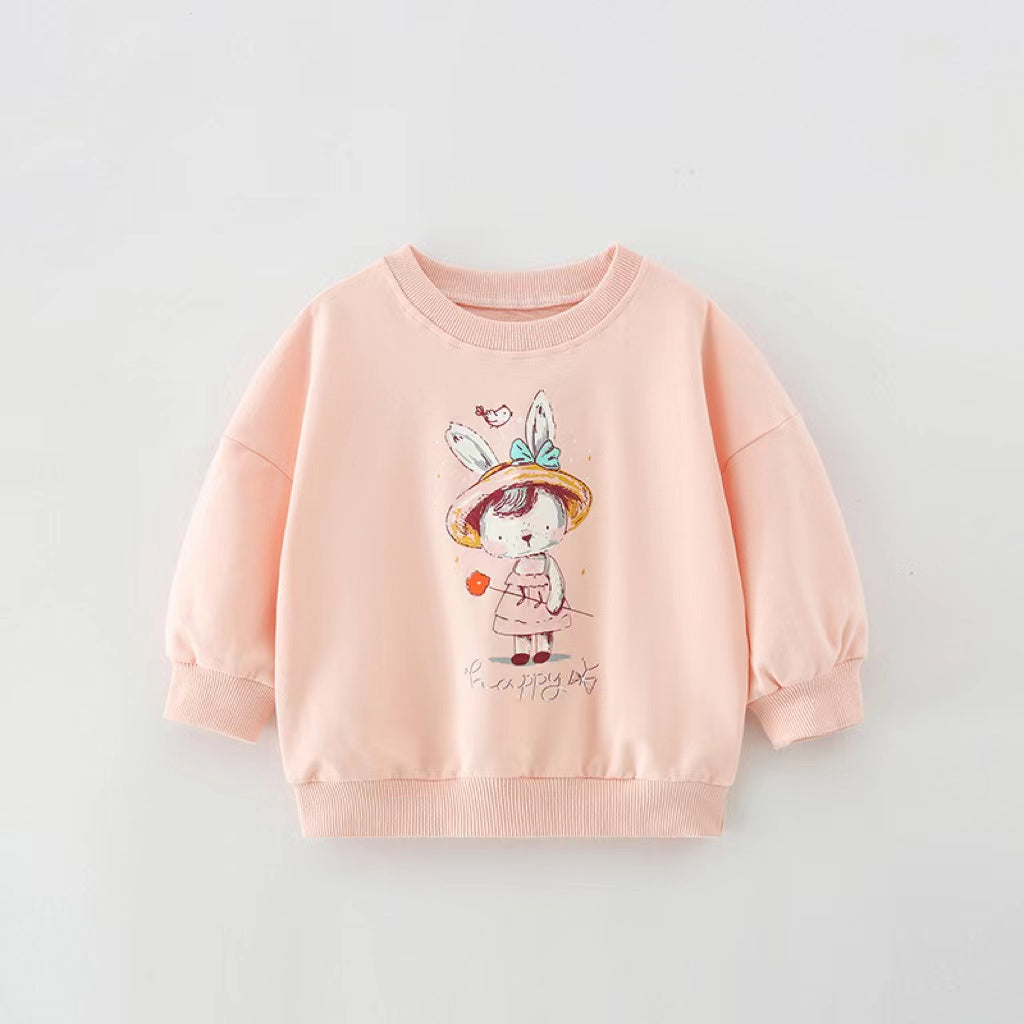 Baby girl wearing a pink cartoon print pullover hoodie with a round neck, featuring playful animal designs.