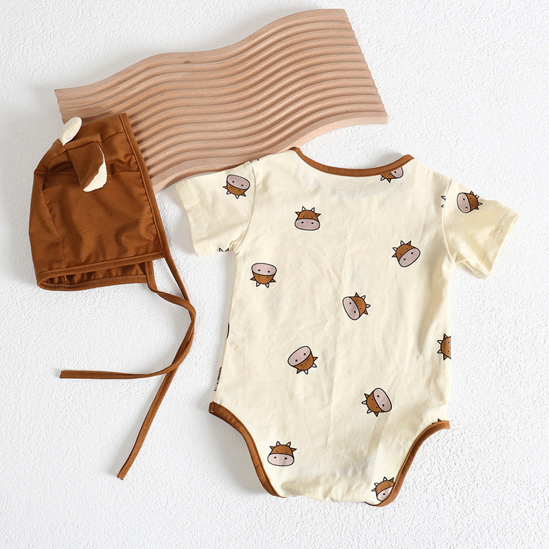 Baby girl wearing a cute cartoon sheep onesie with a round collar and a matching hat, perfect for summer.