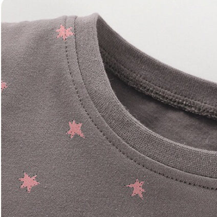 A grey cotton shirt for baby girls featuring colorful cartoon unicorn patches, perfect for casual wear.