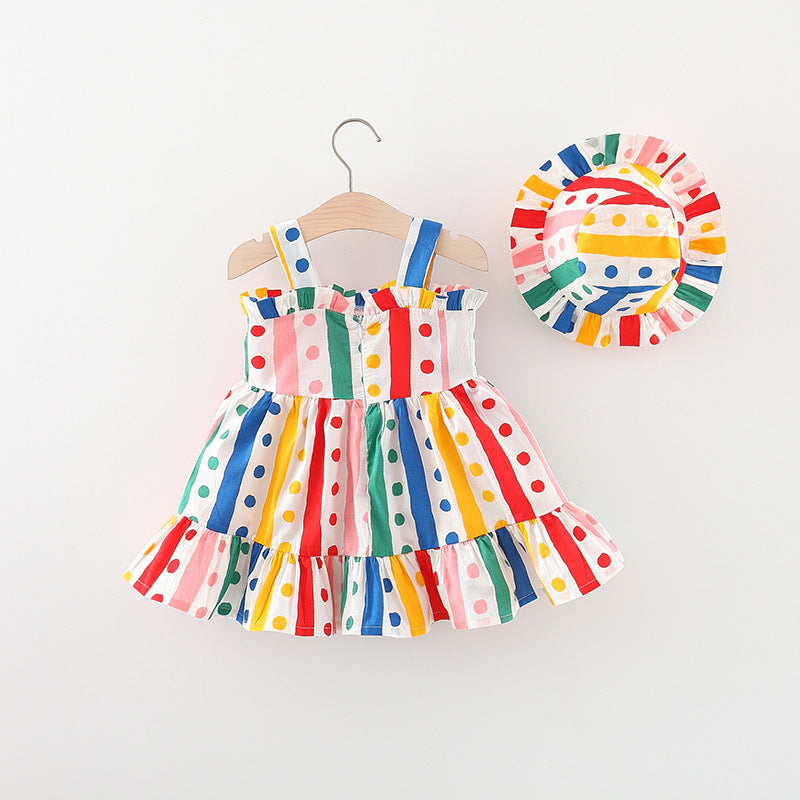 A pink baby girl sling dress featuring a colorful polka dot pattern and a large bow tie design, perfect for summer occasions.