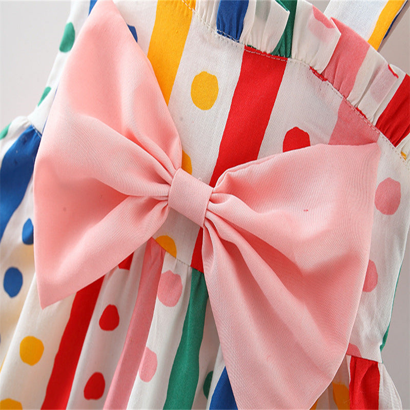 A pink baby girl sling dress featuring a colorful polka dot pattern and a large bow tie design, perfect for summer occasions.