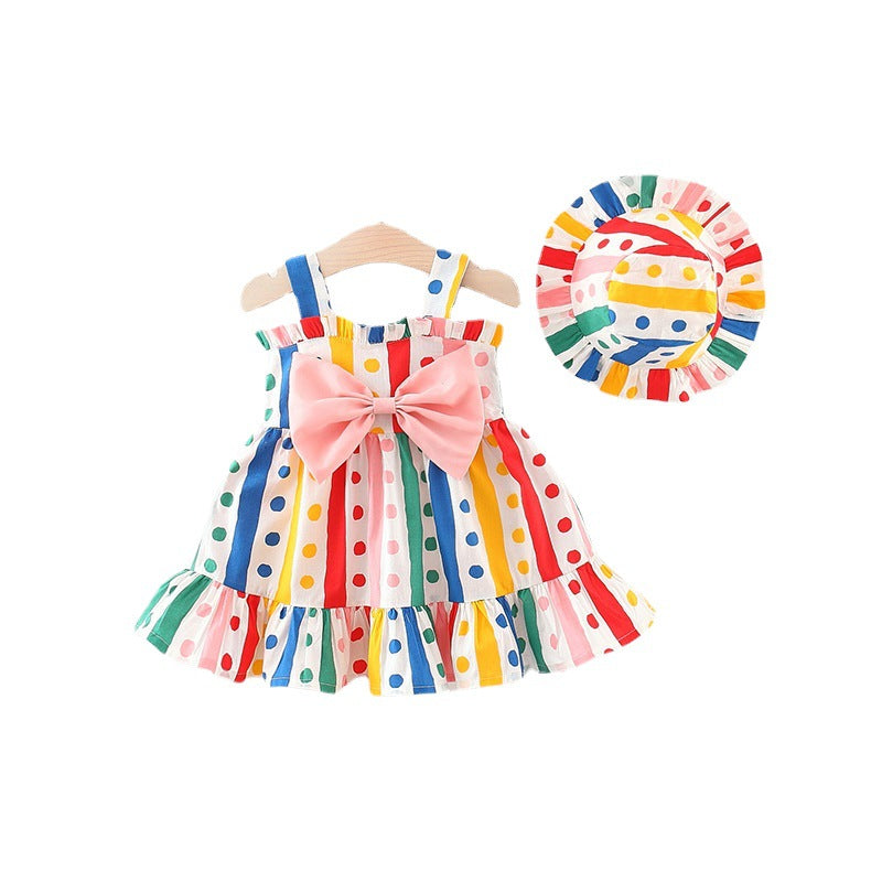 A pink baby girl sling dress featuring a colorful polka dot pattern and a large bow tie design, perfect for summer occasions.