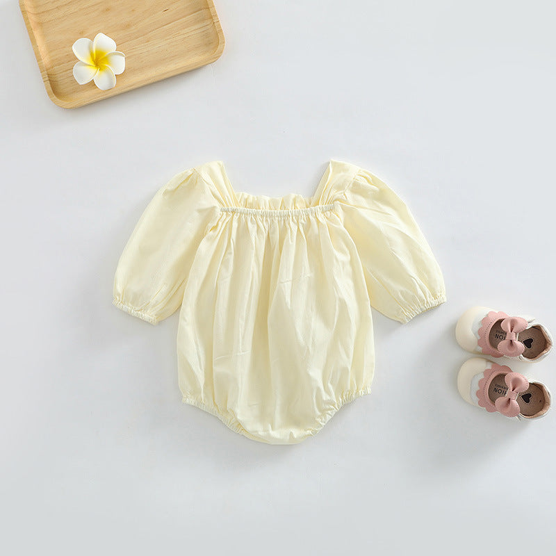 Baby girl long sleeve bodysuit featuring a ditsy flower pattern and solid colors in pink and beige, made from soft cotton fabric.