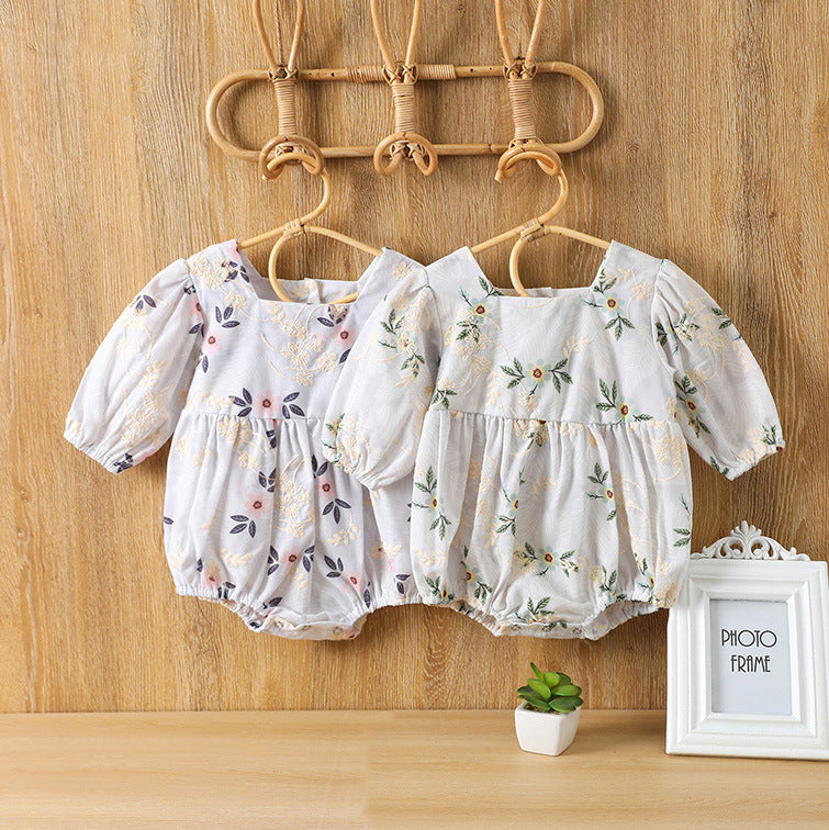 Baby girl floral embroidered bodysuit with square collar in pink and green colors, made from soft cotton fabric.