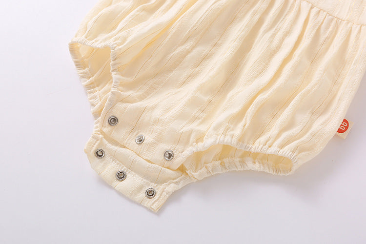 Baby girl onesie featuring floral embroidery design in pink, yellow, and beige colors, perfect for summer wear.