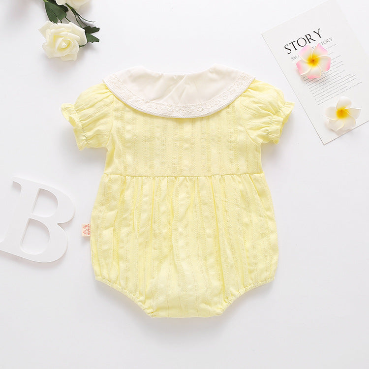 Baby girl onesie featuring floral embroidery design in pink, yellow, and beige colors, perfect for summer wear.