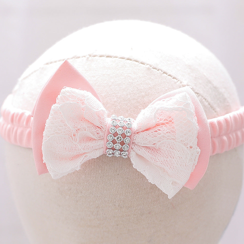 Baby girl wearing a floral mesh overlay formal dress with matching headband, perfect for special occasions.