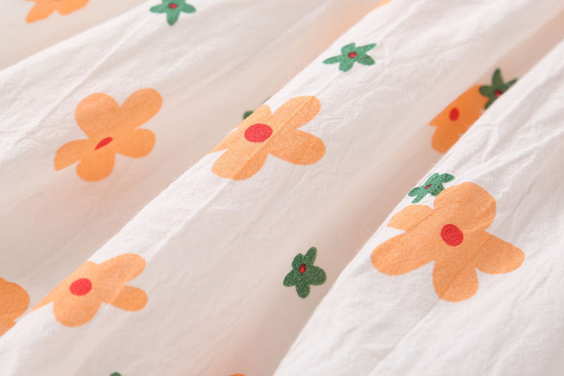 Baby girl floral pattern bow-tie sleeveless onesie in orange with matching sun hat, perfect for summer outings.