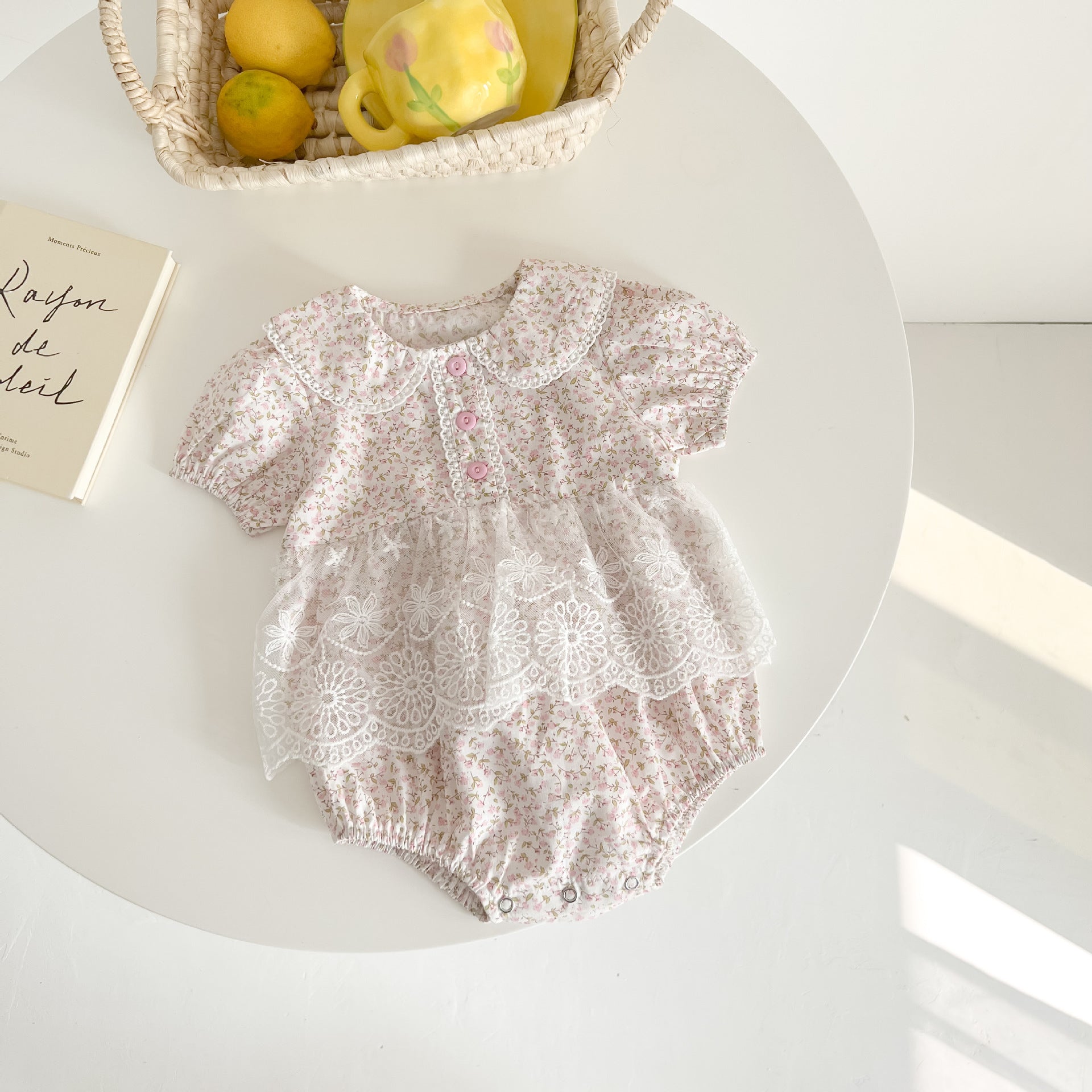 Baby girl floral pattern onesies dress with mesh patches in pink and yellow, perfect for summer wear.