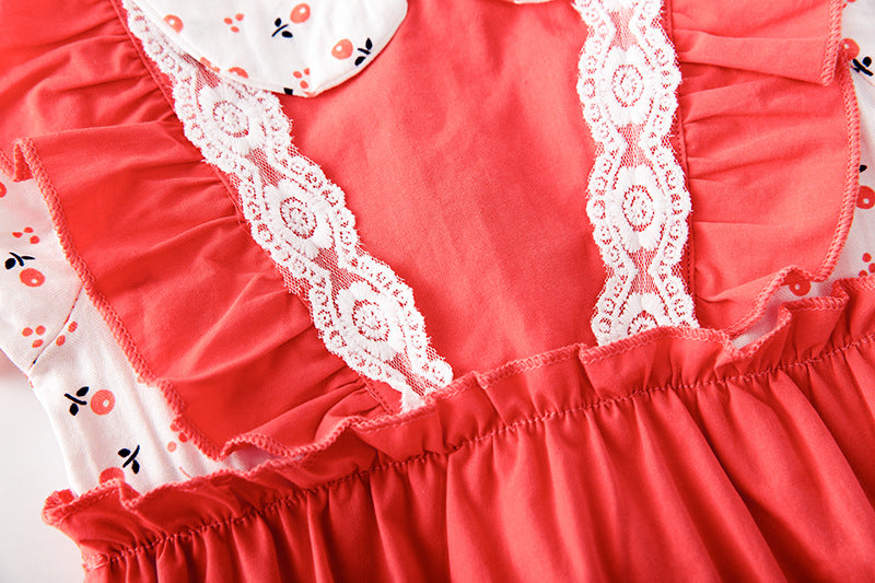 Baby girl onesie featuring floral print, lace patchwork, and ruffle design in vibrant red color.