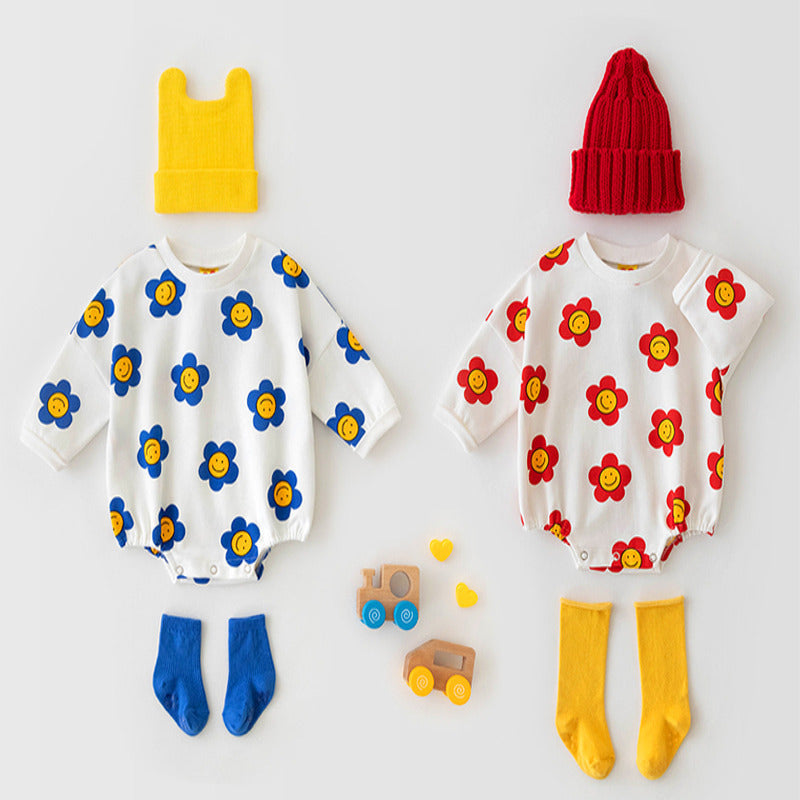 Baby girl wearing a flower graphic long sleeves cotton triangle bodysuit in red, showcasing a vibrant floral design.