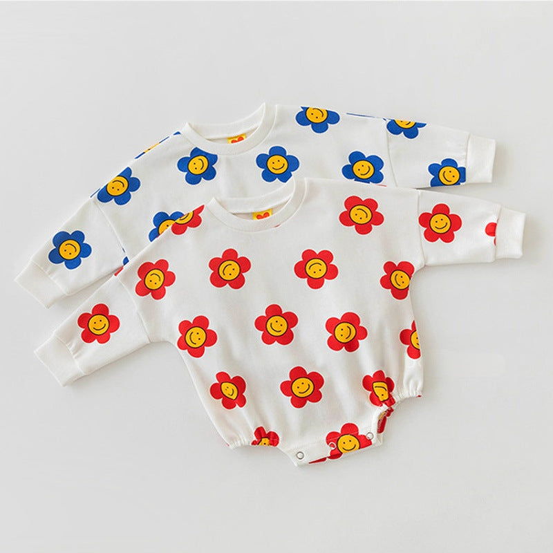 Baby girl wearing a flower graphic long sleeves cotton triangle bodysuit in red, showcasing a vibrant floral design.