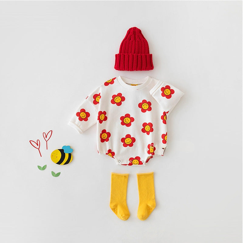 Baby girl wearing a flower graphic long sleeves cotton triangle bodysuit in red, showcasing a vibrant floral design.