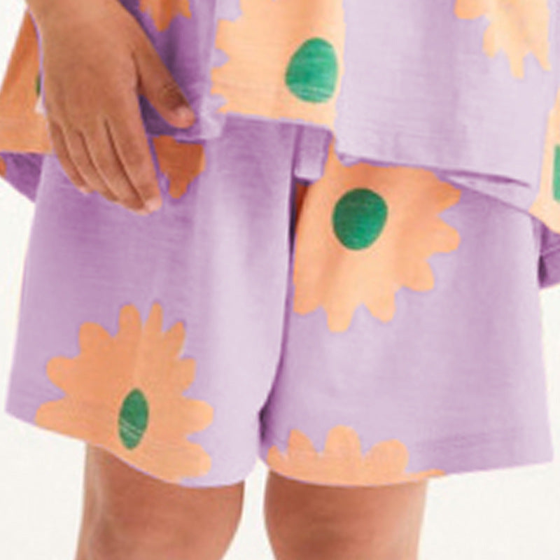 A vibrant Baby Girl Flower Graphic Short Sleeve Summer Set featuring a floral design in purple cotton, perfect for summer wear.