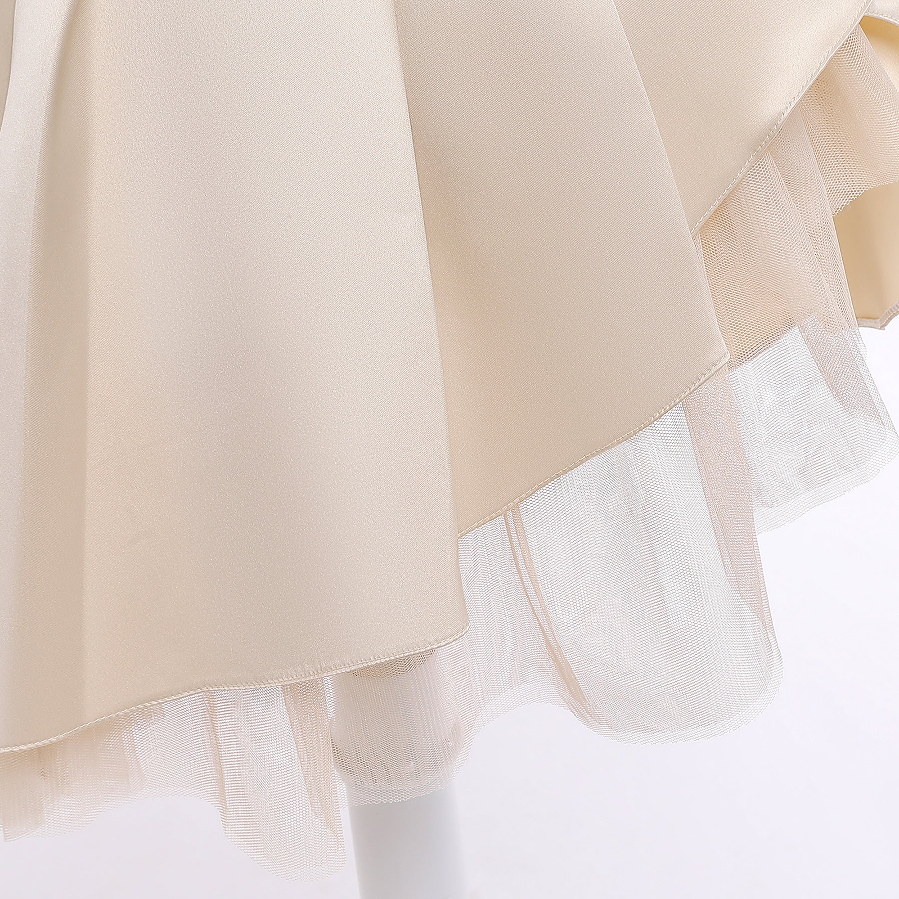 A beautiful baby girl wearing a floral pattern show dress in vibrant colors, perfect for birthday parties and formal occasions.