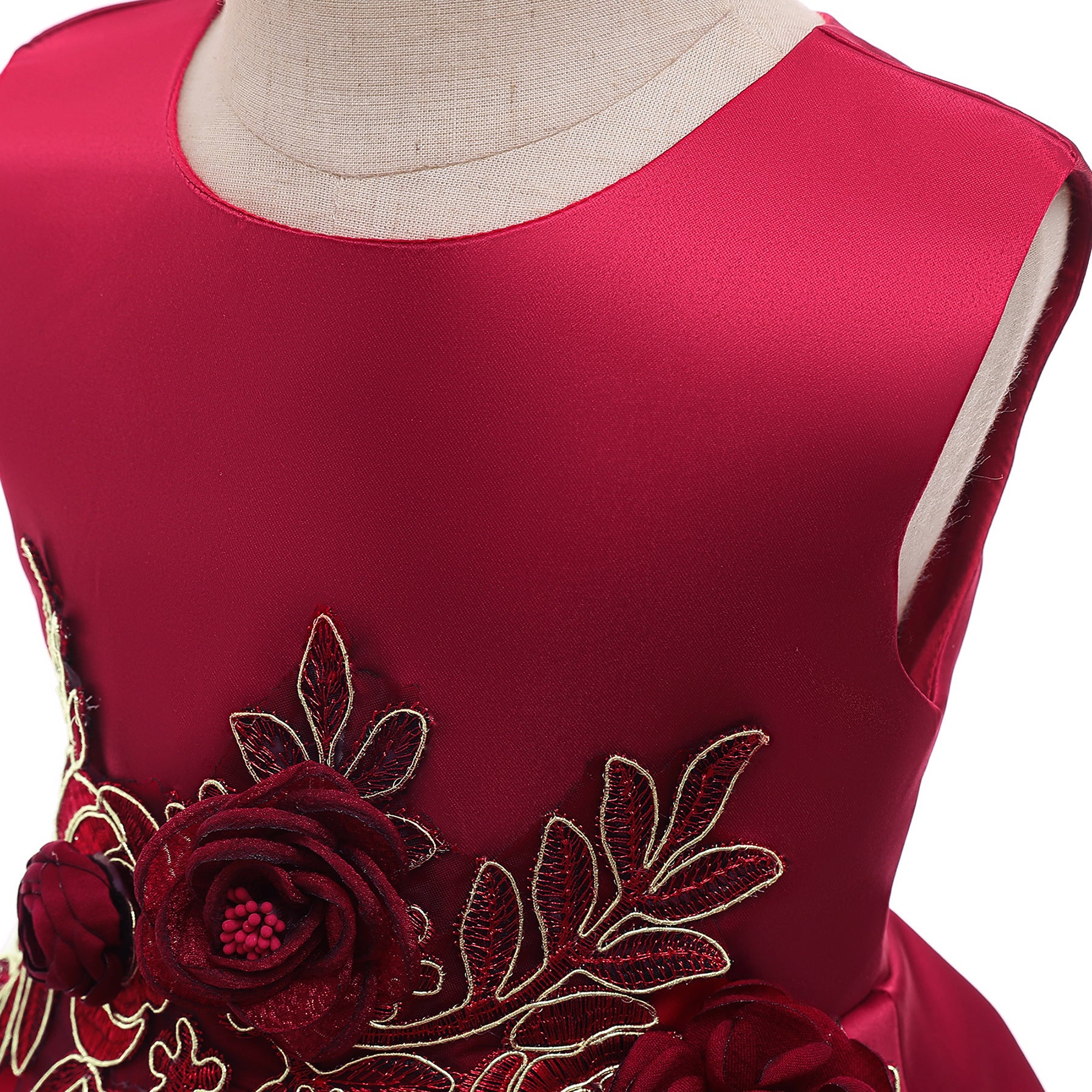 A beautiful baby girl wearing a floral pattern show dress in vibrant colors, perfect for birthday parties and formal occasions.