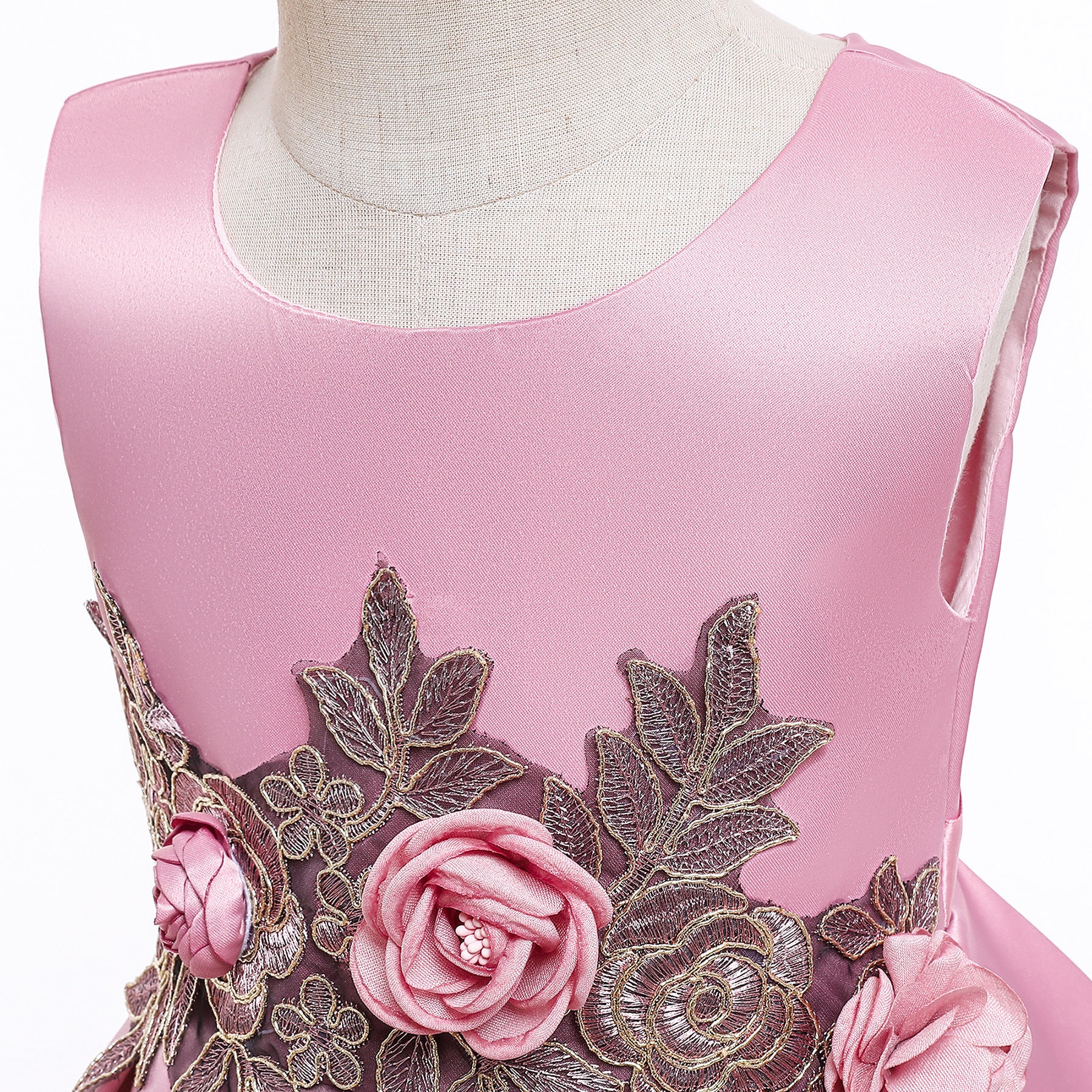 A beautiful baby girl wearing a floral pattern show dress in vibrant colors, perfect for birthday parties and formal occasions.