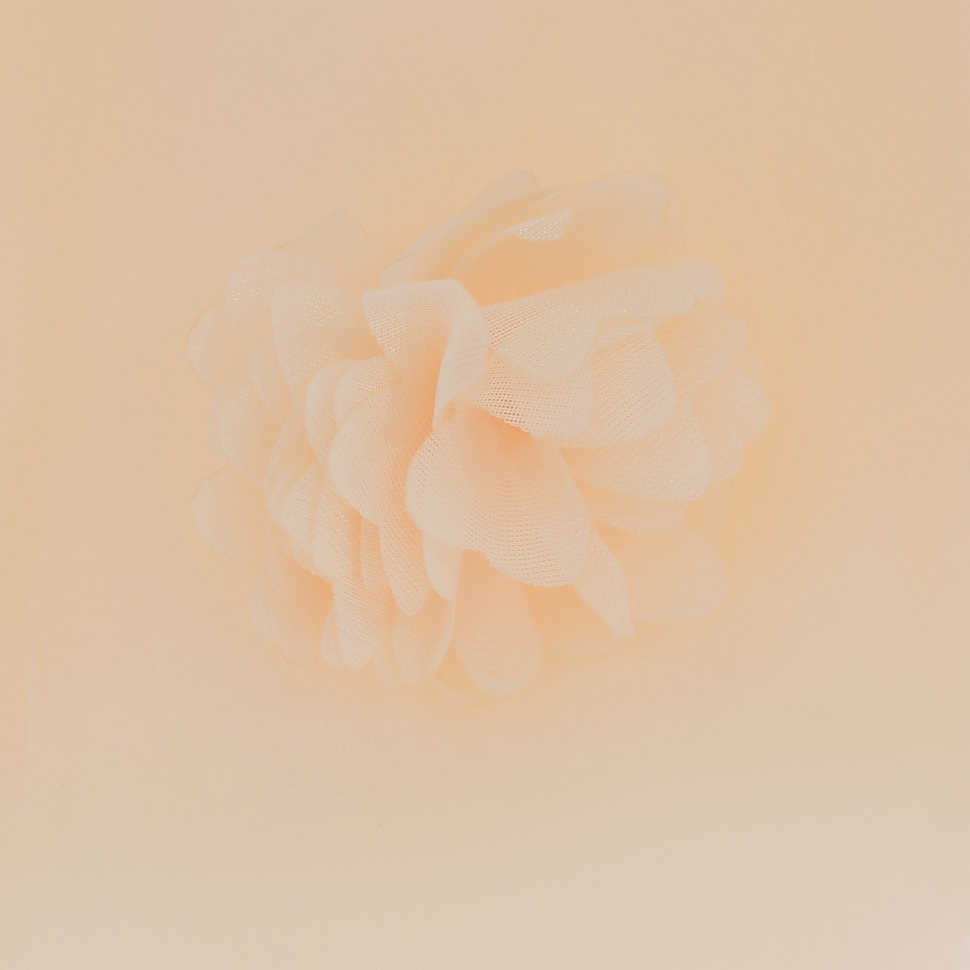 Baby girl wearing a Full Moon Christening Trailing Tutu Formal Dress in white, showcasing delicate tulle fabric and a graceful trailing skirt.