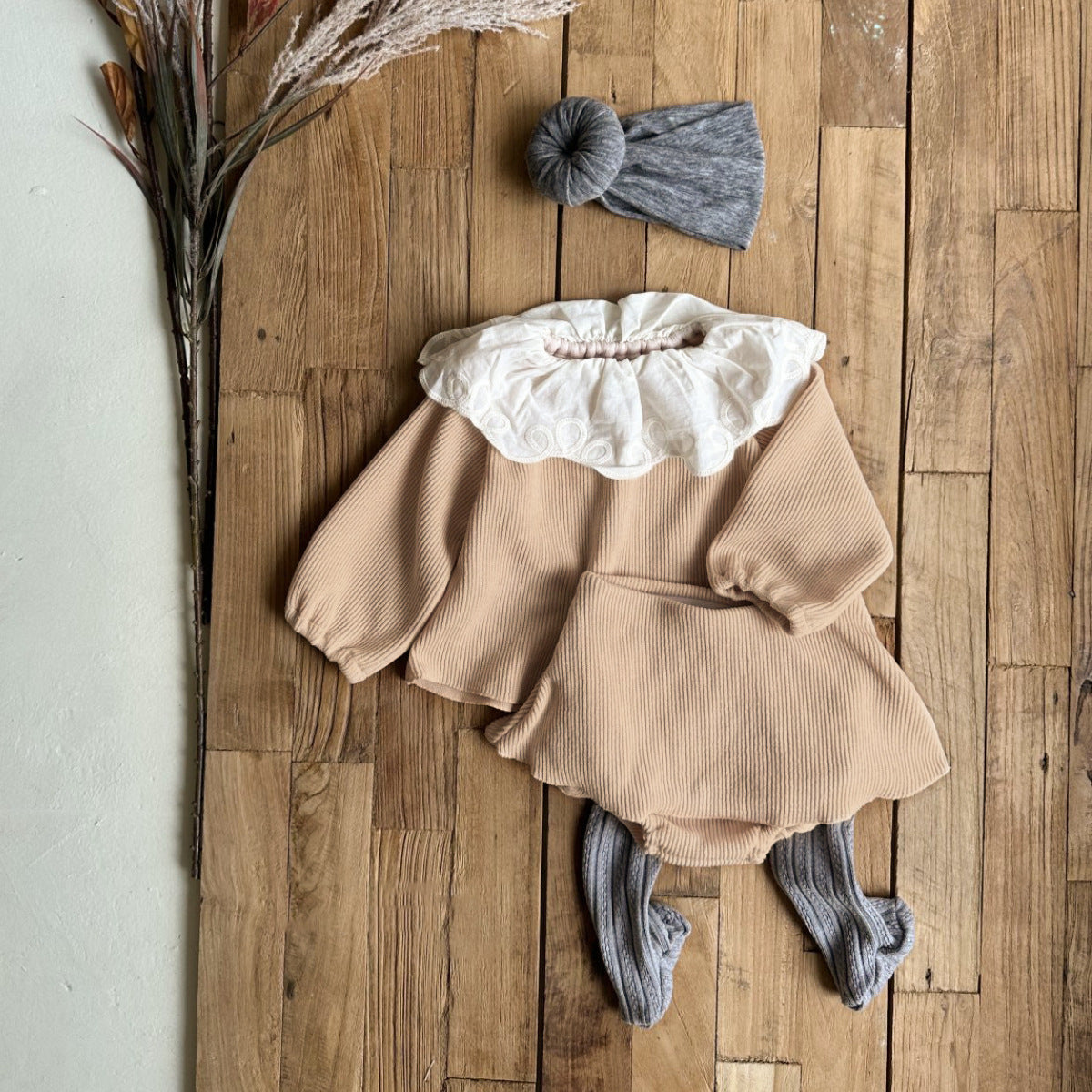 Baby girl two-piece set featuring laces round collars in purple and apricot colors, made from soft cotton material.