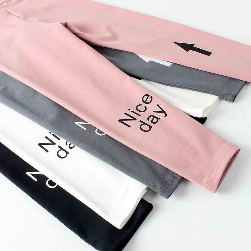 Baby girl leggings featuring a fun letter print pattern in soft cotton, available in multiple colors for autumn wear.