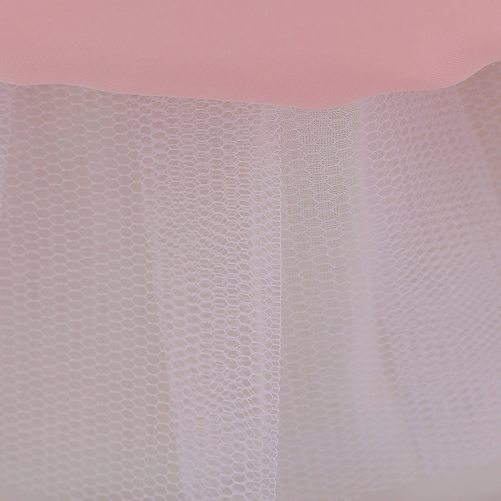 Baby girl wearing a petal patched design sleeveless full moon christening mesh dress in a beautiful floral pattern.