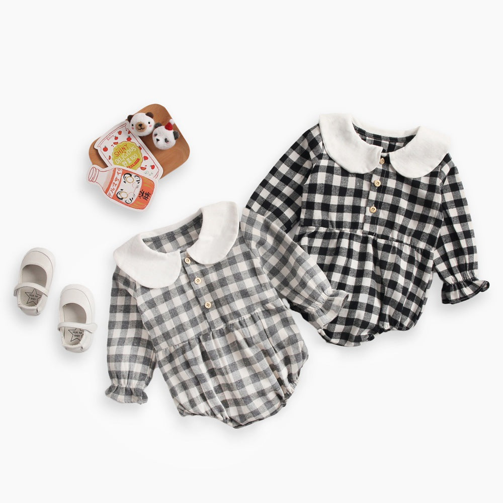 Baby girl long sleeve onesie featuring a plaid pattern and doll collar design in black and grey colors.