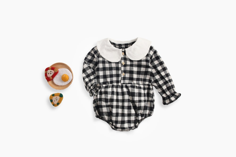 Baby girl long sleeve onesie featuring a plaid pattern and doll collar design in black and grey colors.