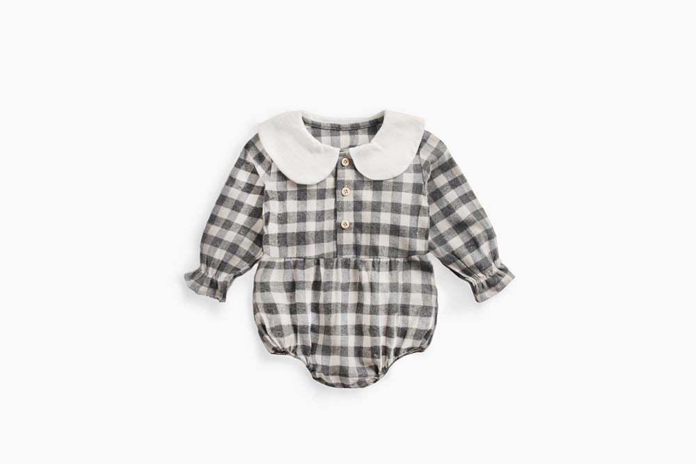 Baby girl long sleeve onesie featuring a plaid pattern and doll collar design in black and grey colors.