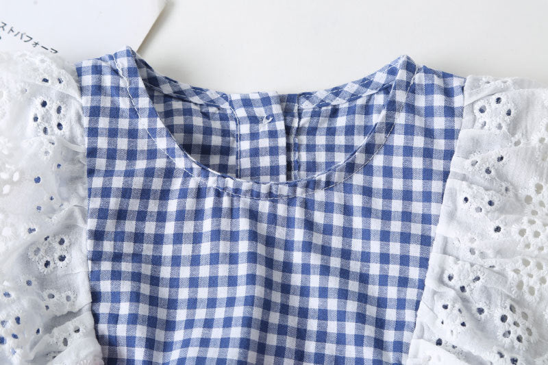 Baby girl sleeveless onesie featuring plaid pattern, lace patchwork, and bow in vibrant yellow color.