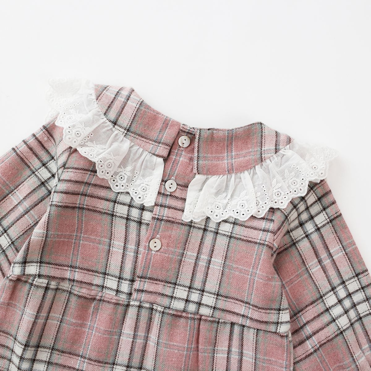 Baby girl romper featuring a plaid pattern and mesh patchwork design with a doll neck bow tie, available in pink and yellow.