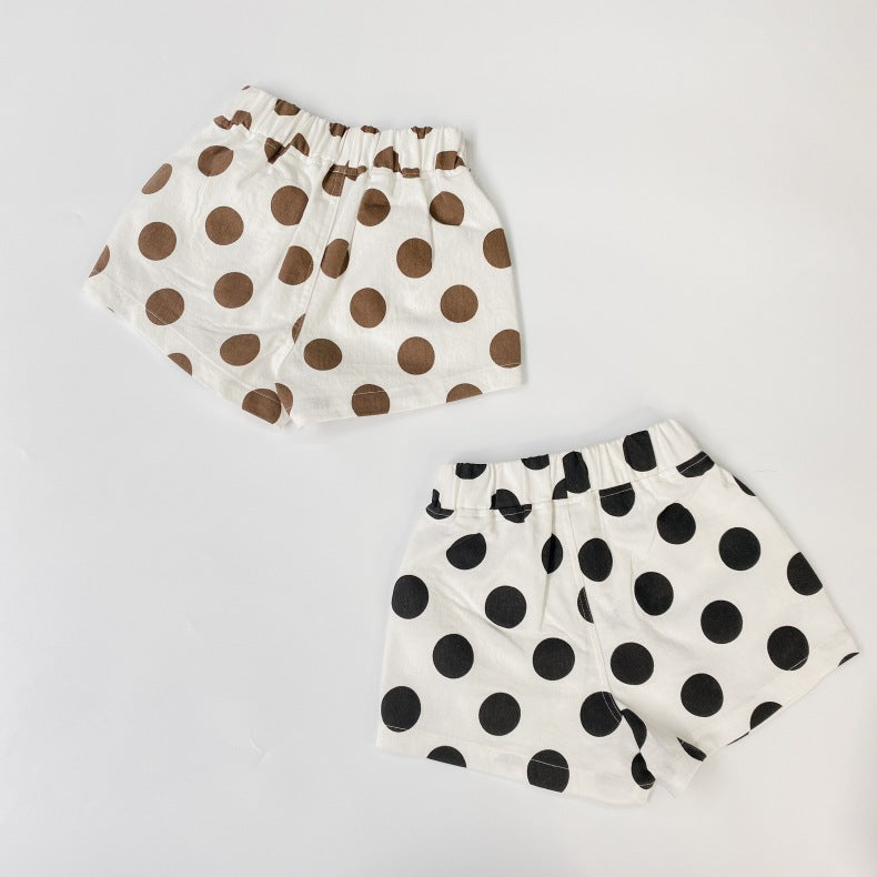 Baby girl polka dot pattern basic shorts in black and brown with pockets, perfect for summer wear.