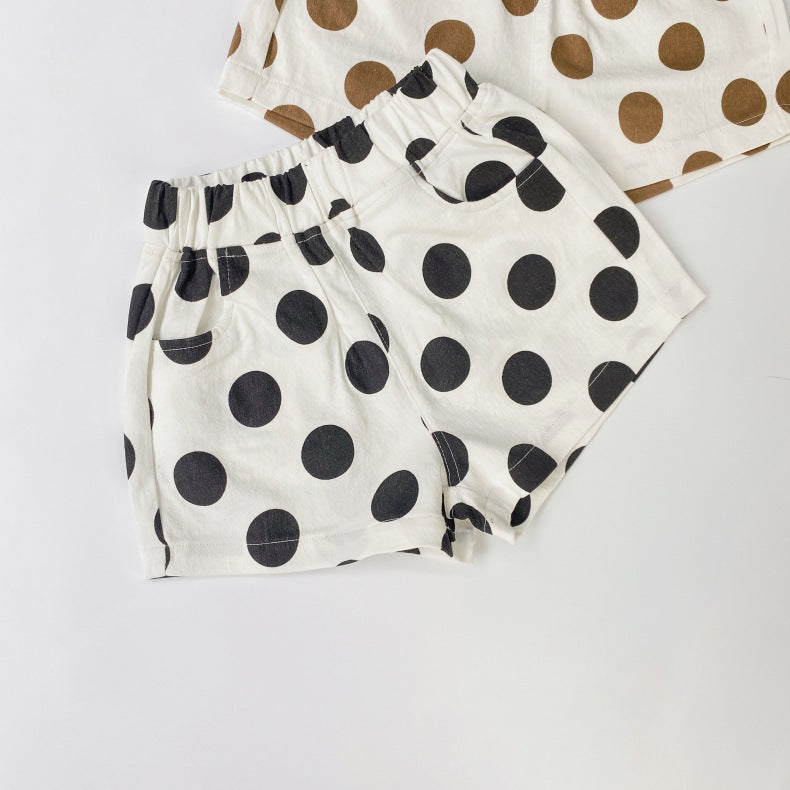 Baby girl polka dot pattern basic shorts in black and brown with pockets, perfect for summer wear.