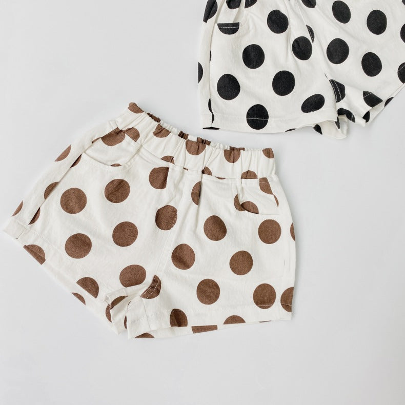 Baby girl polka dot pattern basic shorts in black and brown with pockets, perfect for summer wear.