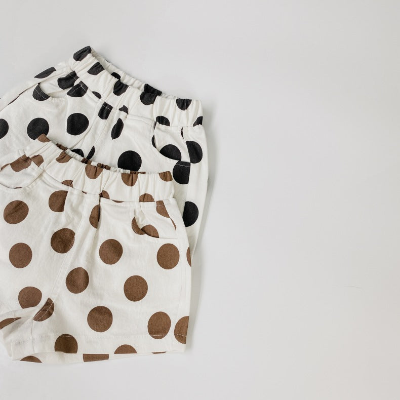 Baby girl polka dot pattern basic shorts in black and brown with pockets, perfect for summer wear.
