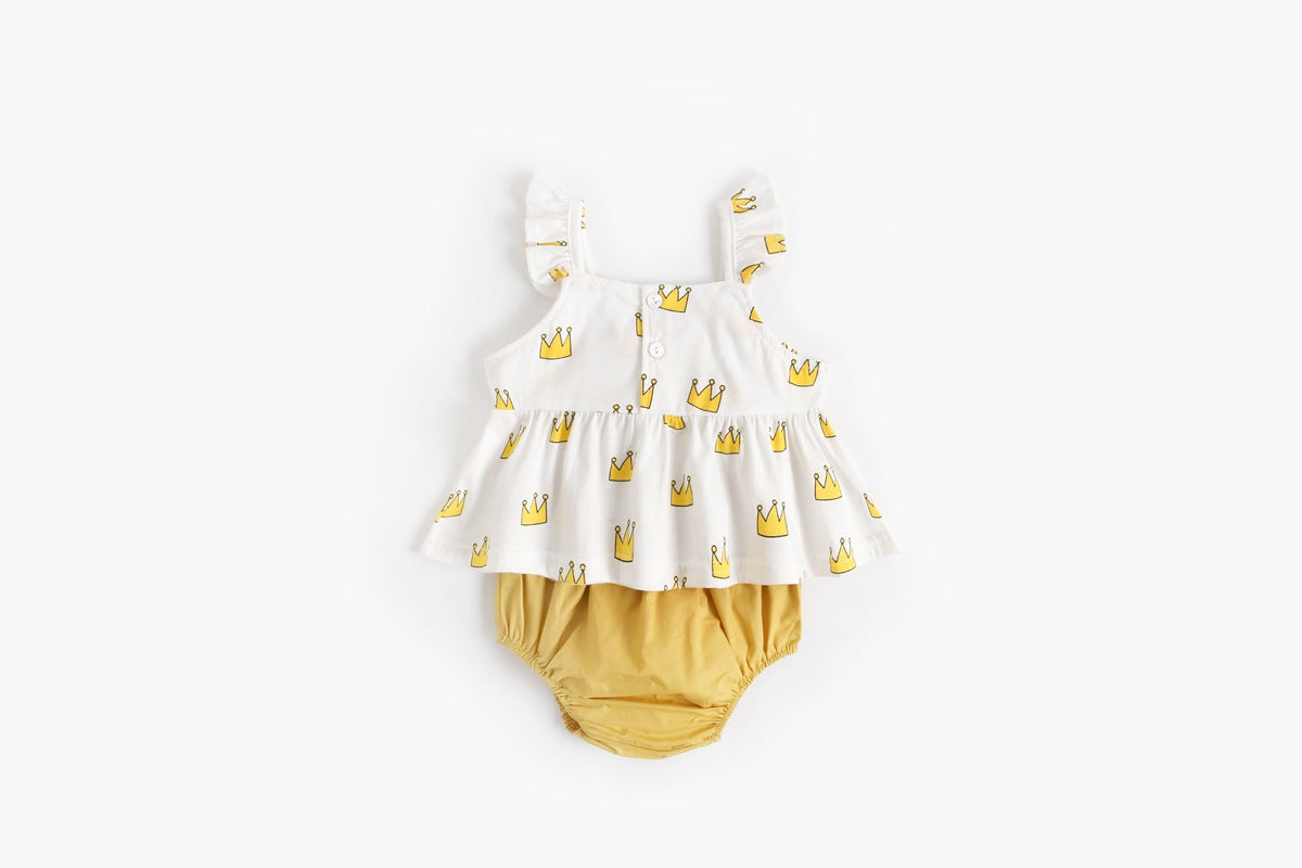 Adorable baby girl outfit featuring a ruffle sleeveless top and matching shorts with a heart printed pattern in pink and yellow.