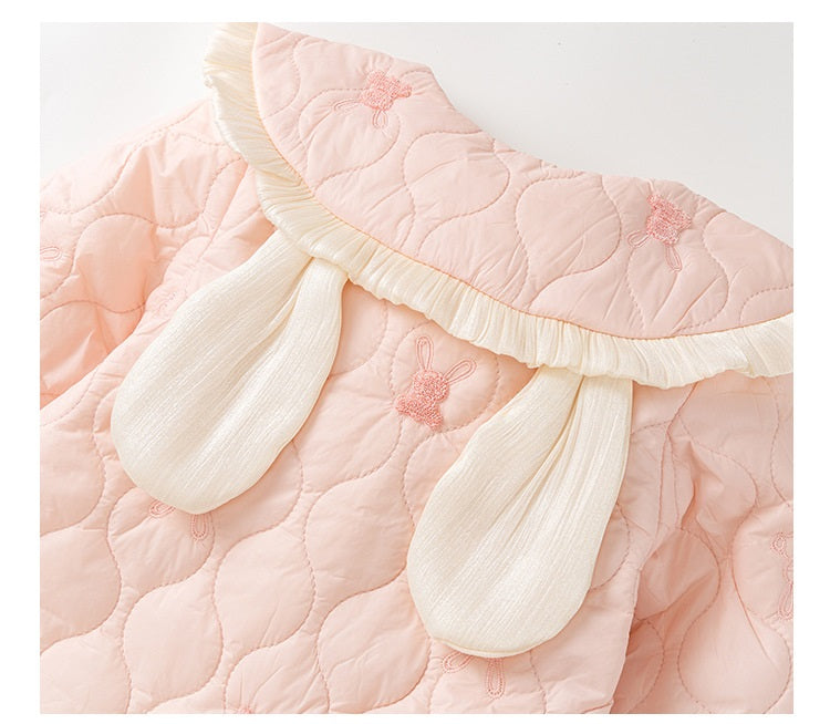 Baby girl wearing a pink rabbit cartoon romper with a Peter Pan collar, showcasing a playful design suitable for all seasons.