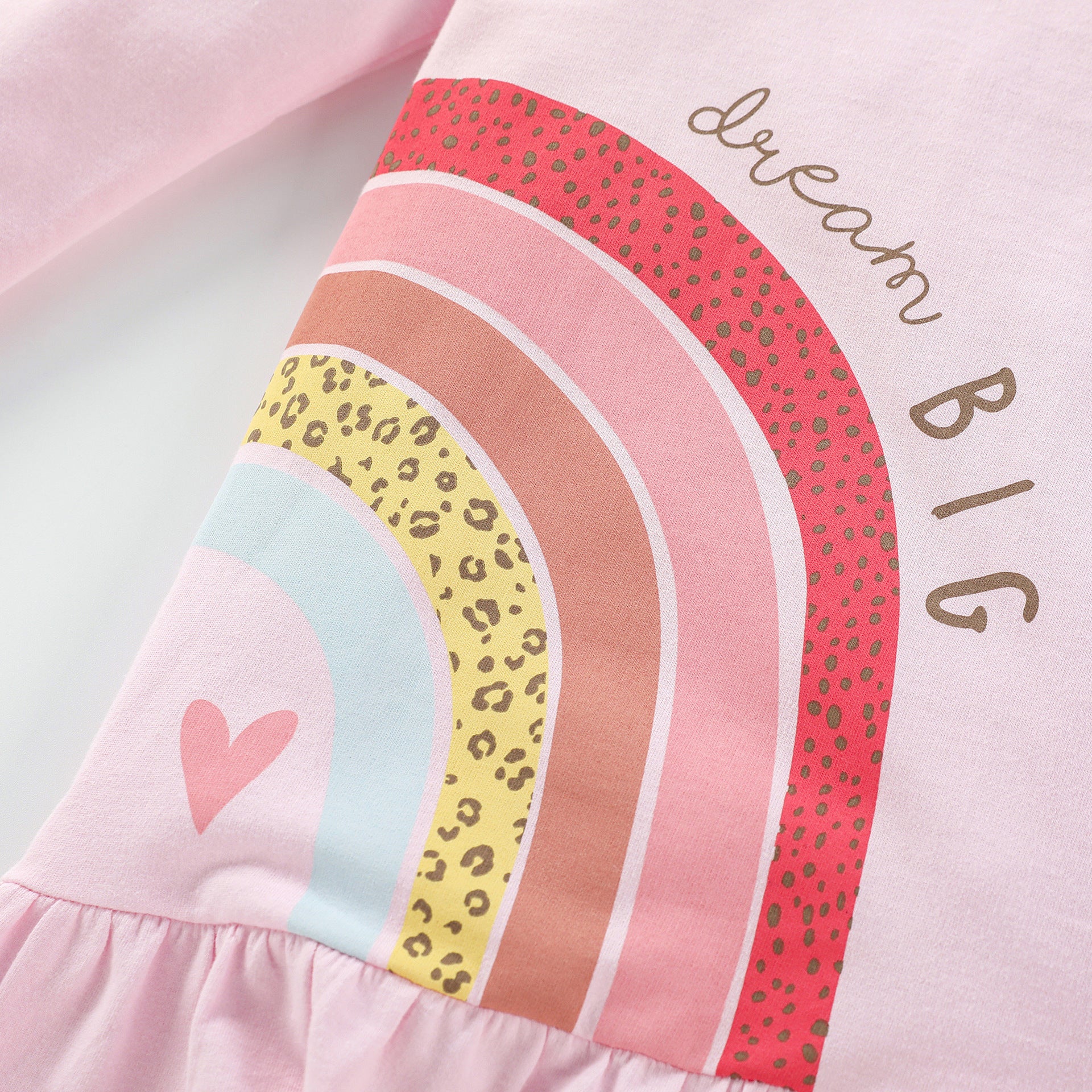 Baby girl dress set featuring a rainbow pattern design with long leggings in pink cotton fabric.