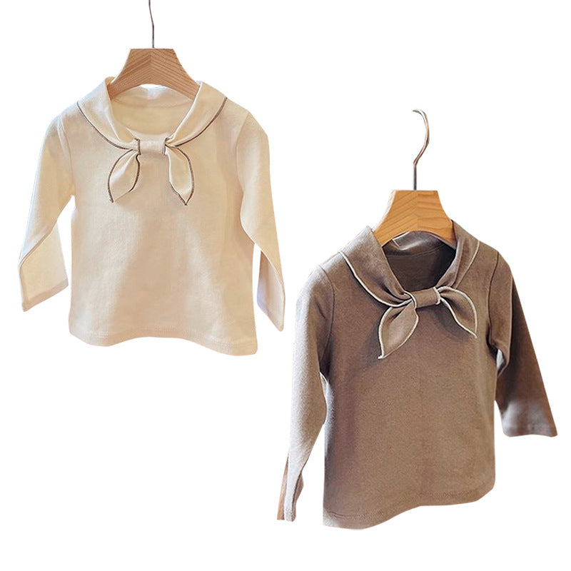 Baby girl long sleeve pullover top with solid color and bow tie design, available in white and coffee, made from soft cotton material.