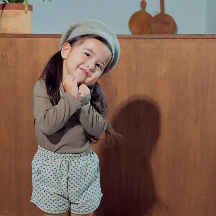 Baby girl long sleeve pullover top with solid color and bow tie design, available in white and coffee, made from soft cotton material.