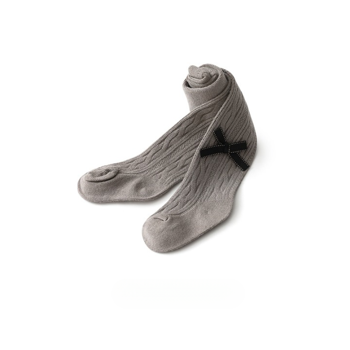 A pair of Baby Girl Solid Color Covered Leggings in various colors, showcasing their soft cotton material and elastic waistband.