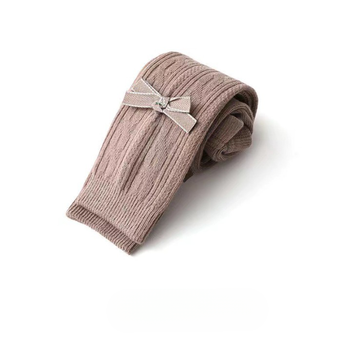 A pair of Baby Girl Solid Color Covered Leggings in various colors, showcasing their soft cotton material and elastic waistband.